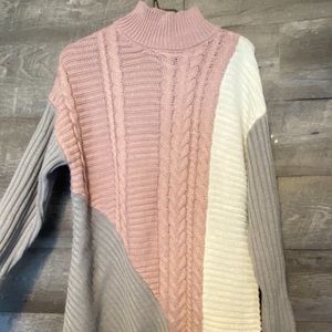 Trendy A-symmetrical mock turtle neck sweater